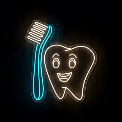 Happy Tooth and Toothbrush LED neon sign featuring a smiling warm white tooth character beside a cyan-blue toothbrush with white bristles on clear acrylic backing for pediatric dental clinic decor.