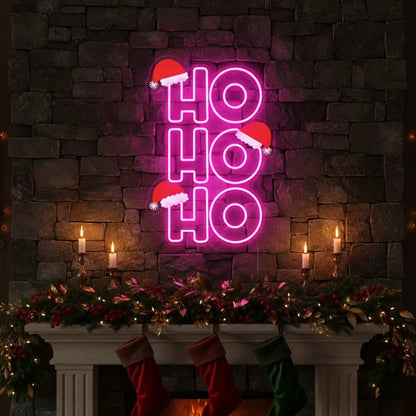 Photo of the 'Ho Ho Ho V3' neon sign glowing in multicolor against a styled interior wall.