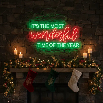 Photo of the 'It’s the Most Wonderful Time of the Year V3' neon sign glowing in multicolor against a styled interior wall.