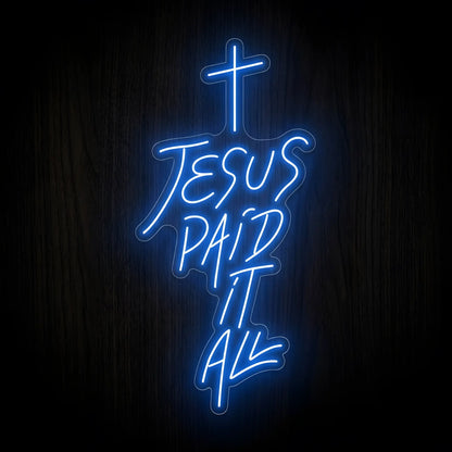 Jesus Paid It All LED neon sign featuring a Christian cross with vibrant blue illumination on a precision-cut clear acrylic backing for inspirational Christian wall decor.