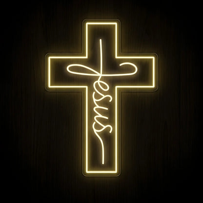 Jesus Cross LED neon sign featuring the name Jesus incorporated into a glowing cross design with warm white illumination on a precision-cut clear acrylic backing.