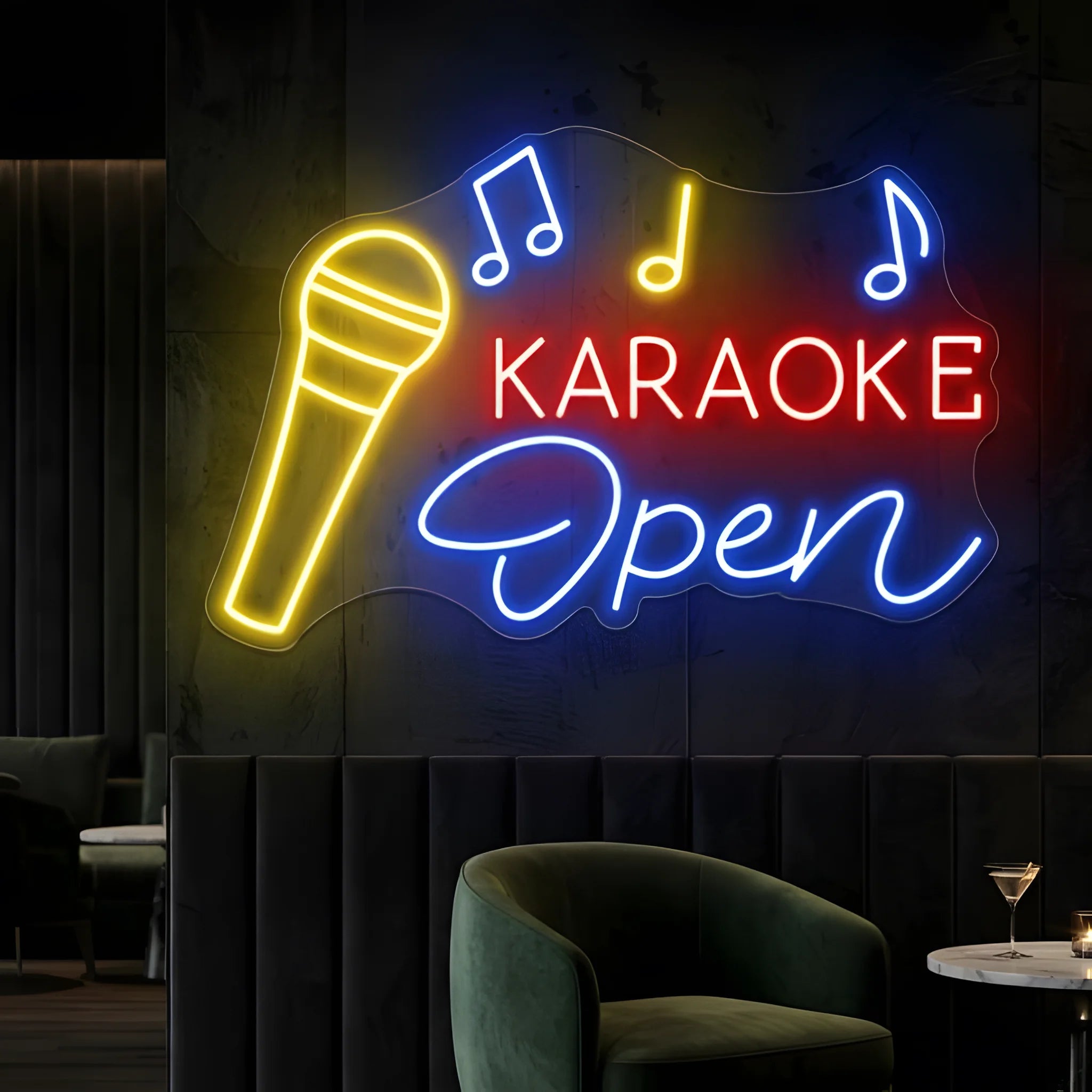 Photo of the 'Karaoke Open' neon sign glowing in multi-color against a styled interior wall.