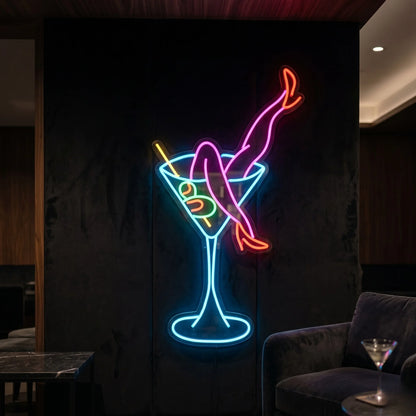 Photo of the martini legs neon sign glowing in multi-color against a styled interior wall.