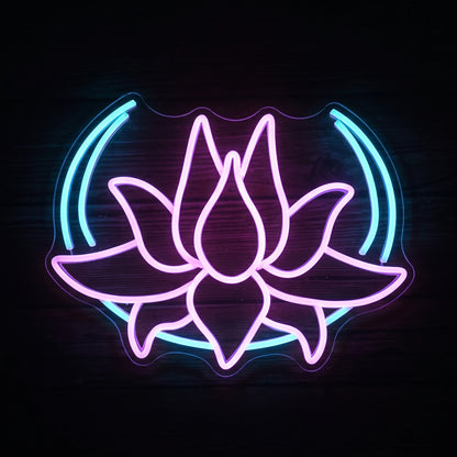 Lotus flower LED neon sign with pink, purple and blue illumination on clear acrylic backing.