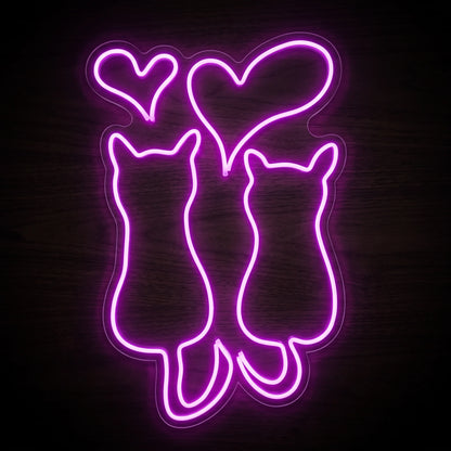 Love Cats LED Neon Sign featuring two pink-purple cat silhouettes sitting beneath glowing heart outlines on clear acrylic backing.