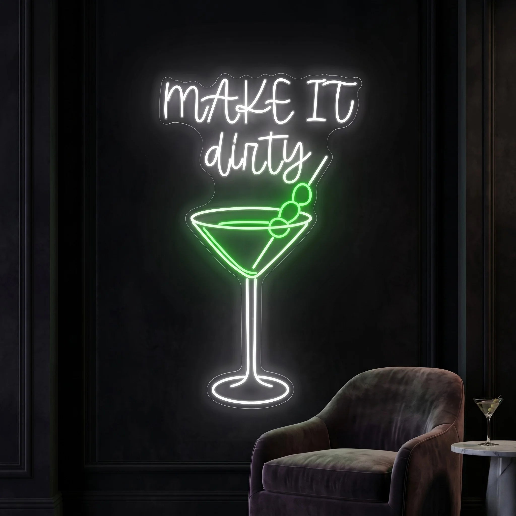 Photo of the 'Make It Dirty' neon sign glowing in multi-color against a styled interior wall.