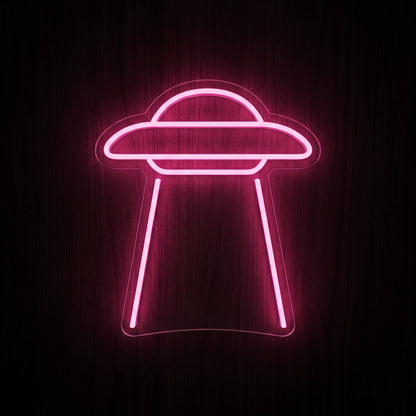 Minimal UFO LED Neon Sign featuring a pink flying saucer outline with descending light beams on clear acrylic backing.