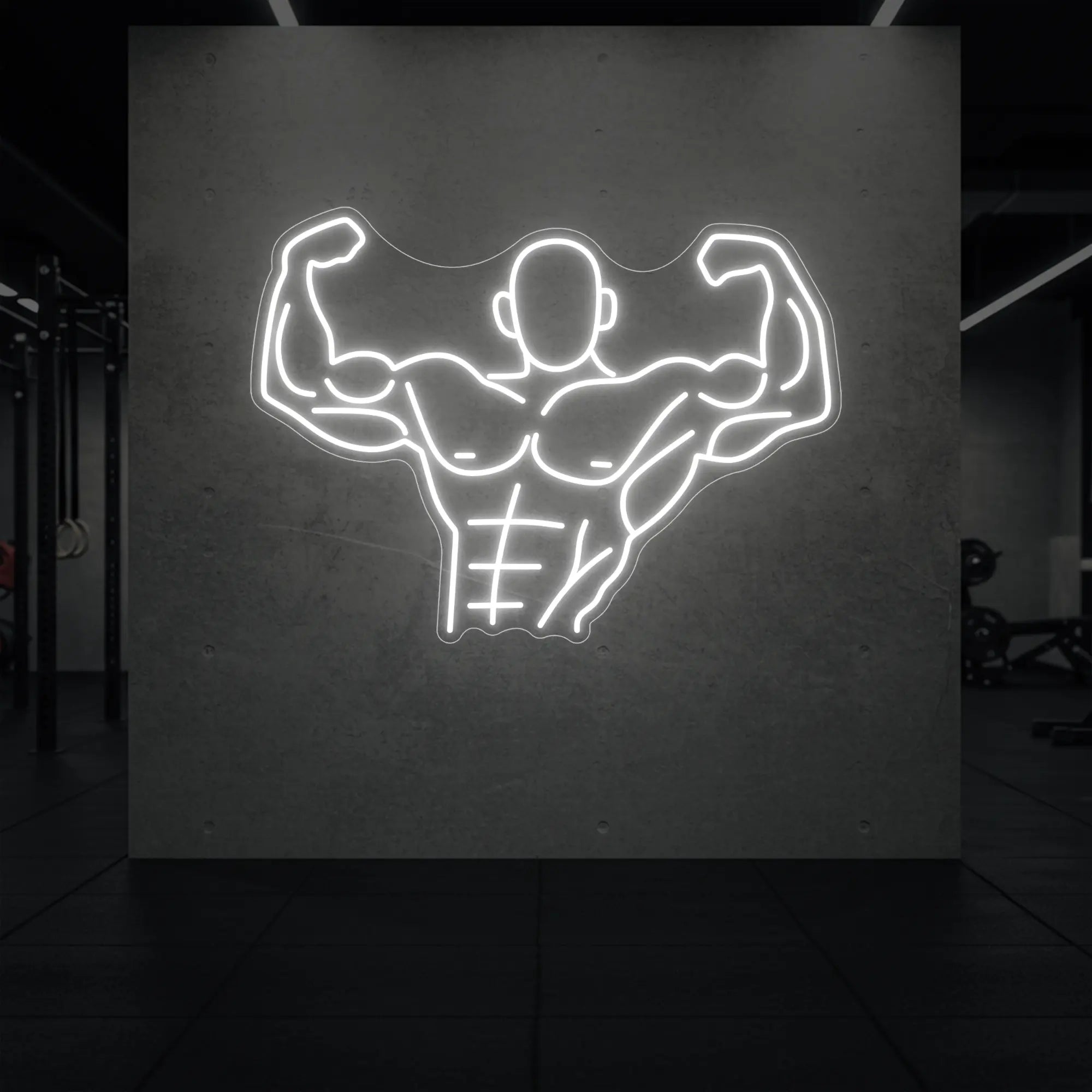'Muscle Man (Torso-Up Flex)' neon sign glowing in cool white against a styled interior wall.