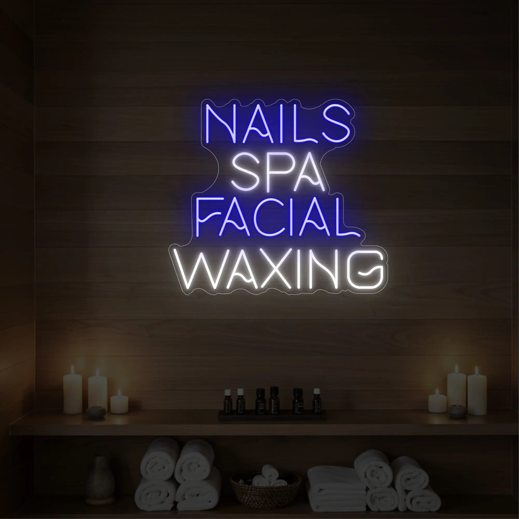Photo of the 'Nails Spa Facial Waxing' neon sign glowing in deep blue against a styled interior wall.