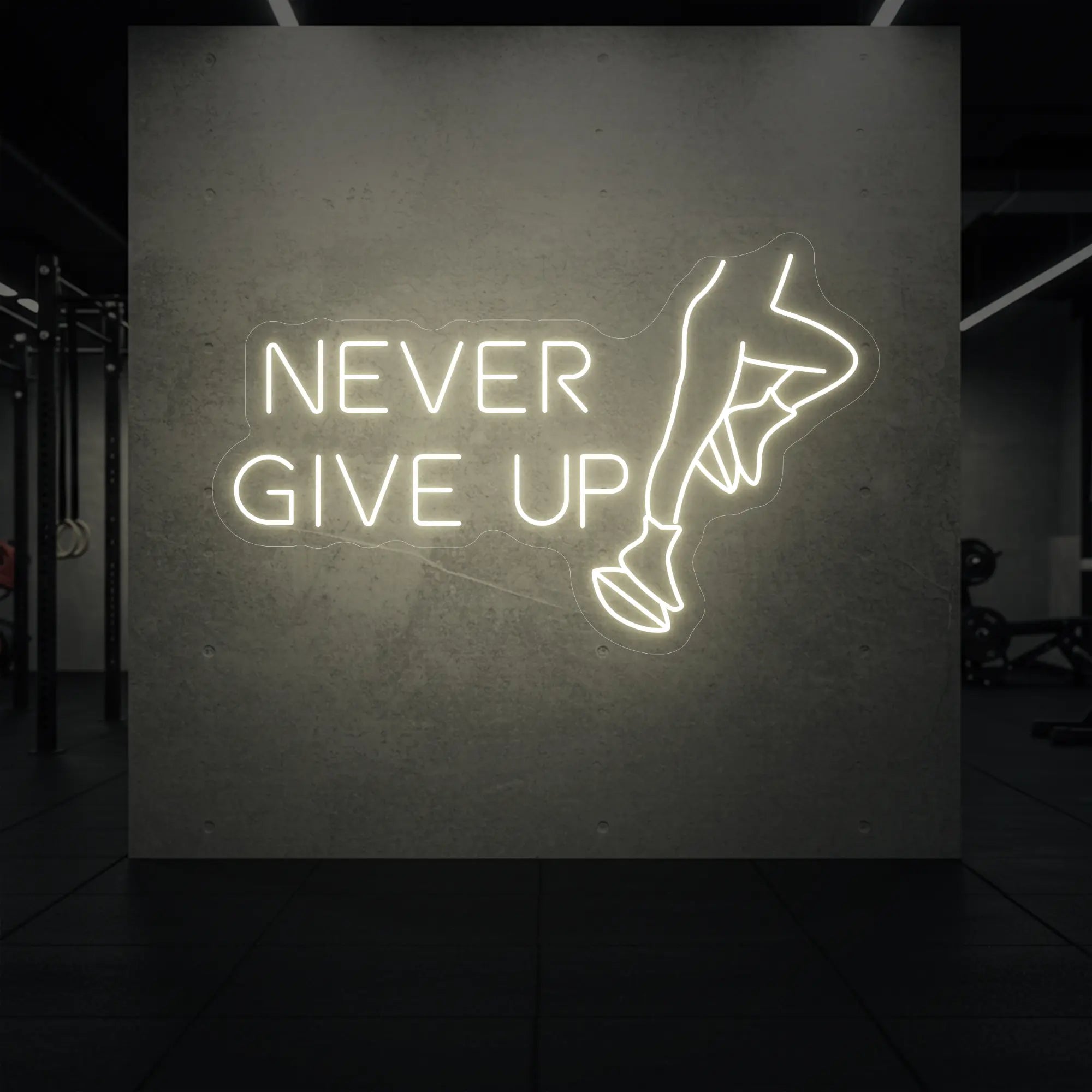 'NEVER GIVE UP' neon sign glowing in warm white against a styled interior wall.