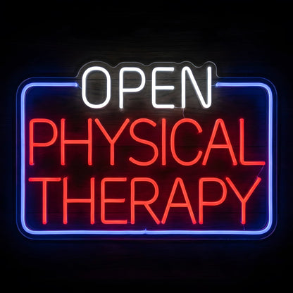 Open Physical Therapy Clinic LED Neon Sign with white OPEN lettering, red PHYSICAL THERAPY text, and a glowing blue rectangular border on clear acrylic against a dark wooden wall.