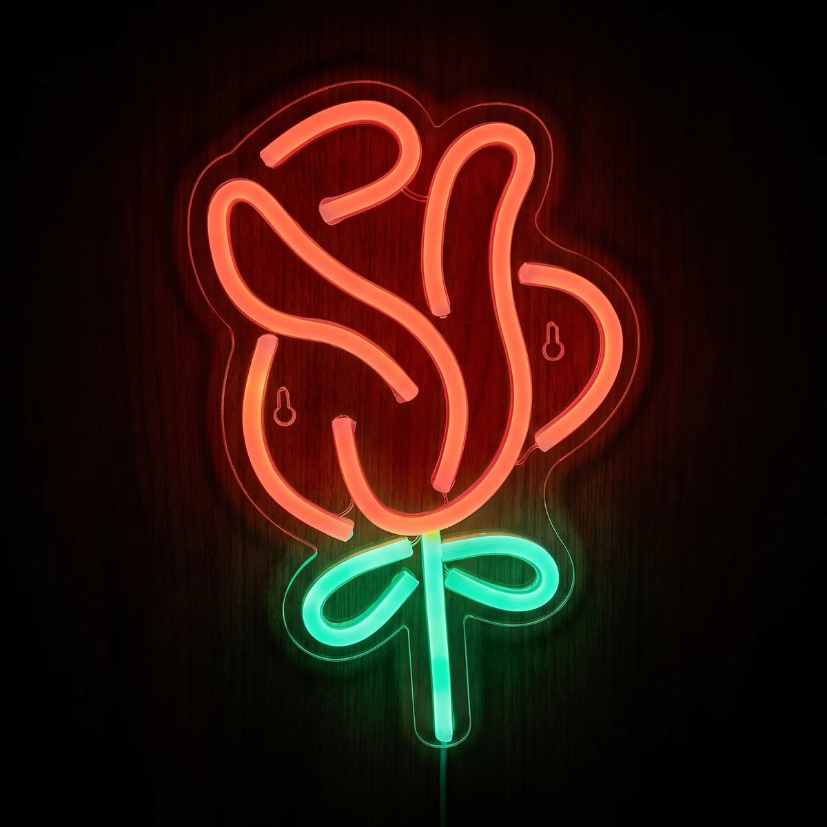 Rose Flower LED Neon Sign featuring a glowing red rose with bright green stem and leaves on clear acrylic backing.