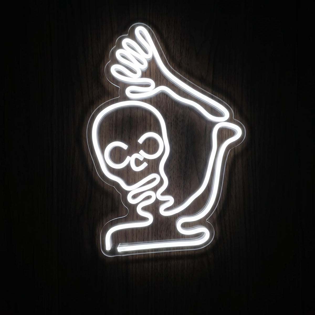 Skeleton Shaka LED Neon Sign featuring a white glowing skeleton making a shaka hand gesture on clear acrylic backing.