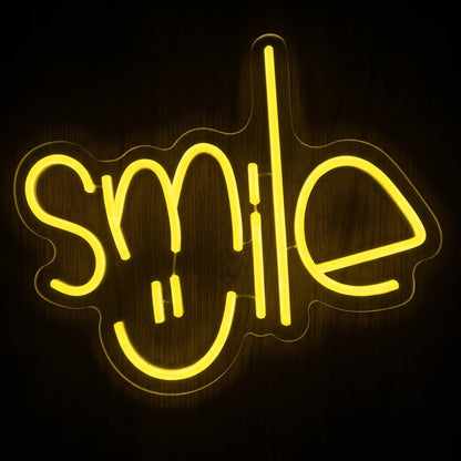 Smile Face LED Neon Sign featuring bright yellow Smile lettering creatively designed with a playful smiling face.