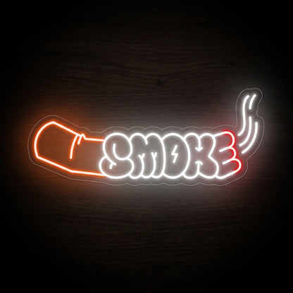 Smoking Joint Outline LED neon sign featuring bold bubble-style "SMOKE" lettering integrated with a smoking pre-roll on a clear acrylic backing.