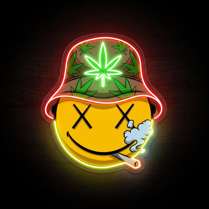 Smoking smiley bucket hat LED neon sign on clear acrylic backing with green, red, yellow, orange, and white illumination for recreational wall décor.