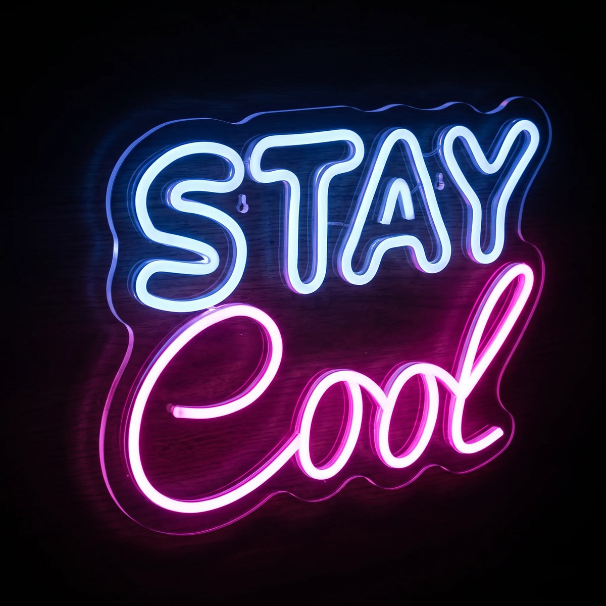 Stay Cool LED neon sign with cool white STAY lettering and vibrant pink Cool script on clear acrylic backing.