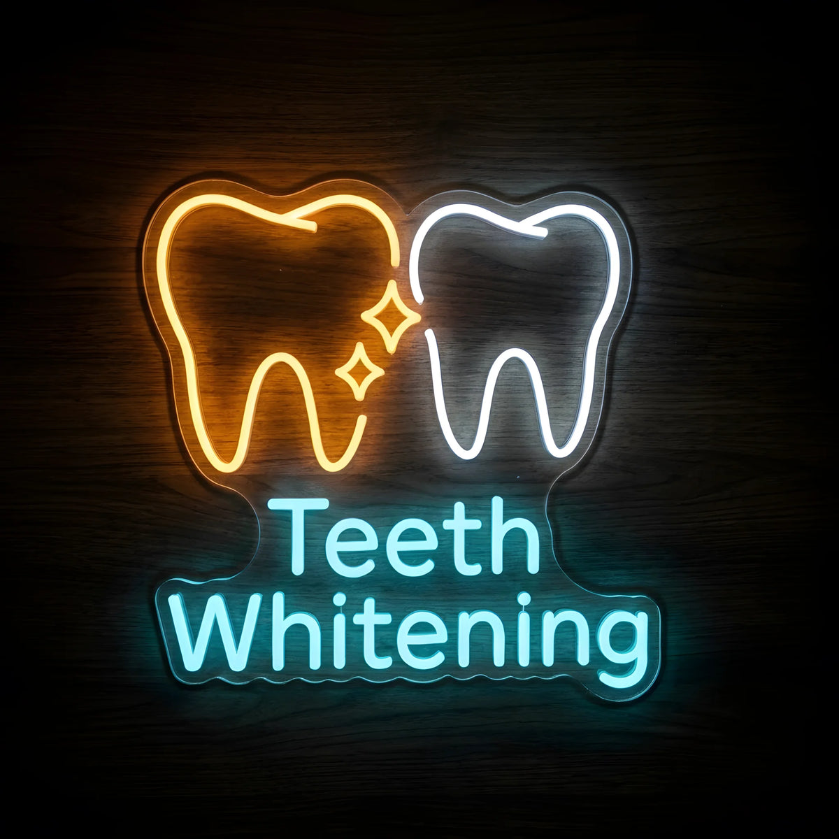 Teeth Whitening Sparkle LED neon sign featuring golden-yellow and cool white tooth outlines, yellow sparkle accents, and cyan-blue Teeth Whitening lettering on clear acrylic backing for cosmetic dental clinic decor.