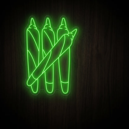 Triple Pre-Rolls LED neon sign featuring three stacked pre-rolls with a diagonal joint in bright green mounted on a precision-cut clear acrylic backing.