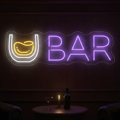 Photo of the 'Whiskey Bar Version 2' neon sign glowing in multi-color against a premium whiskey bar-inspired wall.