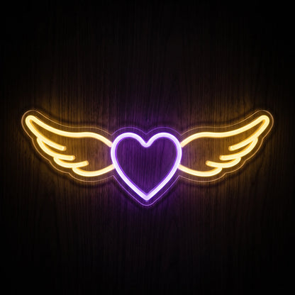 Winged Heart LED Neon Sign featuring a glowing purple heart with warm yellow wings on clear acrylic backing.