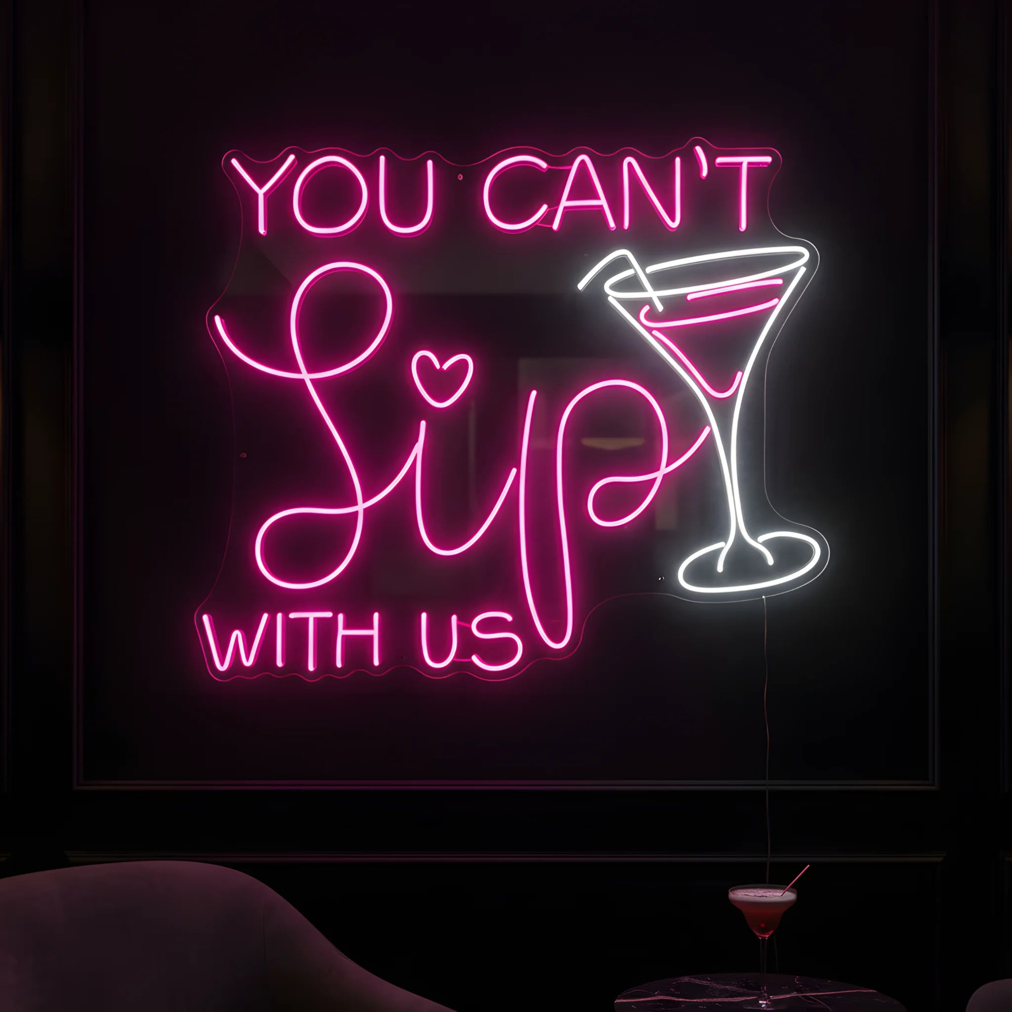 Photo of the 'Wine Time' neon sign glowing in multi-color against a cozy wine bar-inspired wall.