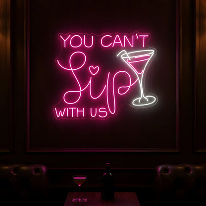 Photo of the 'Wine Time' neon sign glowing in multi-color against a cozy wine bar-inspired wall.