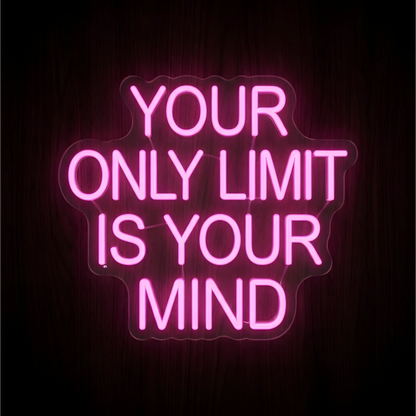 Your Only Limit Is Your Mind LED Neon Sign displaying “YOUR ONLY LIMIT IS YOUR MIND” in bright pink uppercase lettering across four centered lines on contoured clear acrylic backing against a dark wood background, ideal for home office and gym motivational wall decor.